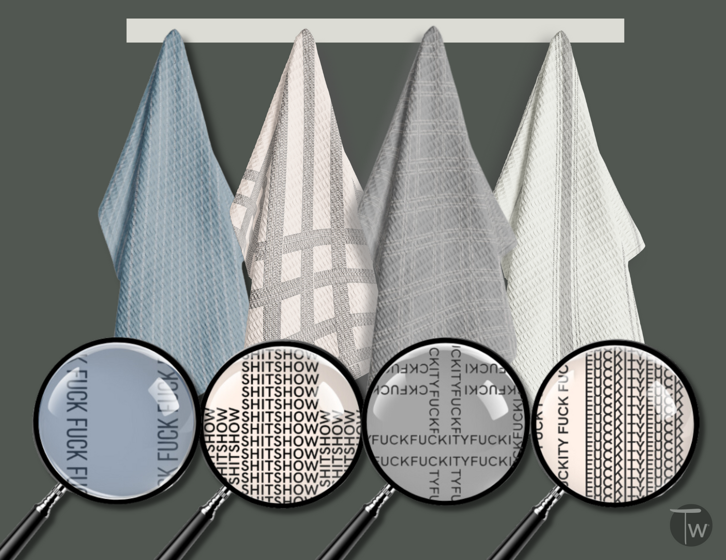 Pardon My French Stripe Illusion Perfect Towel in gray, white, and blue hanging on a rack with magnifying glasses showing ...