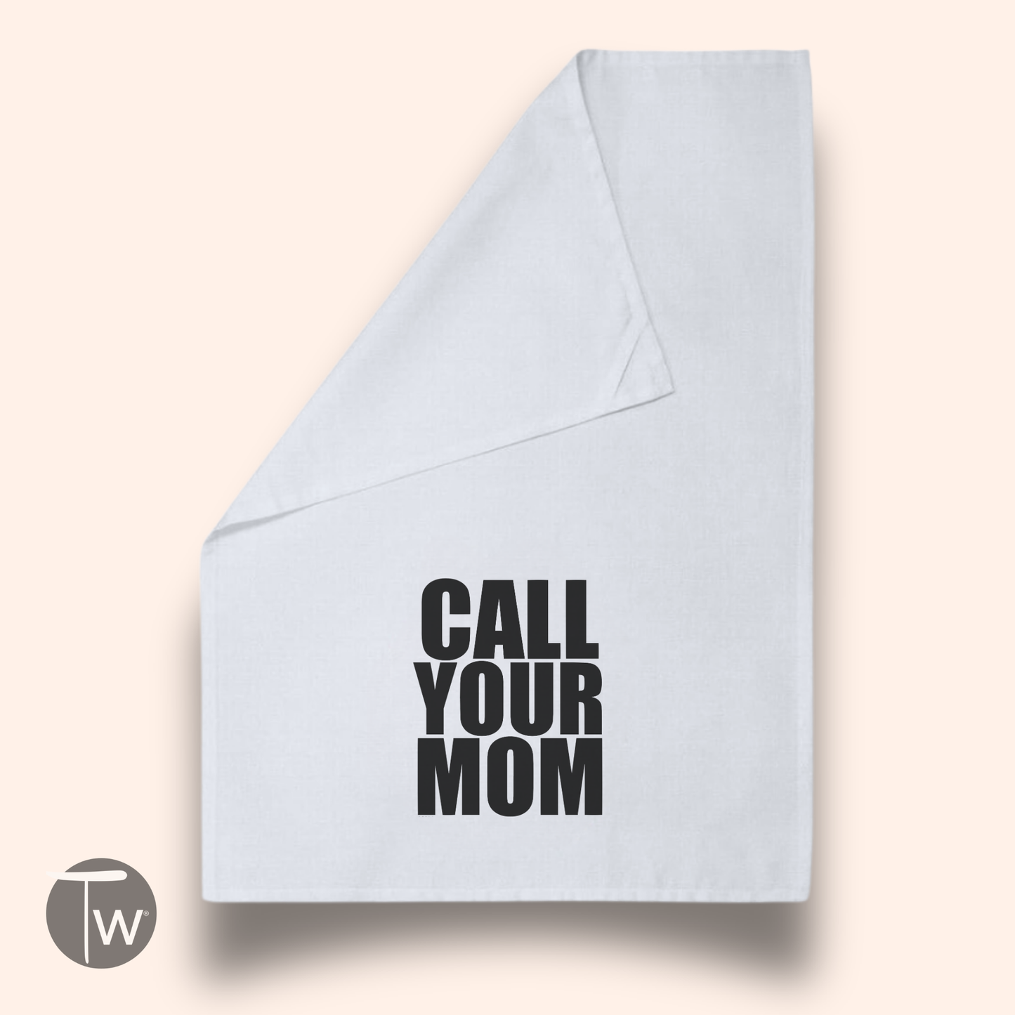 Call Your Mom funny cotton tea towel in white with bold black text, displayed at an angle on a light background.