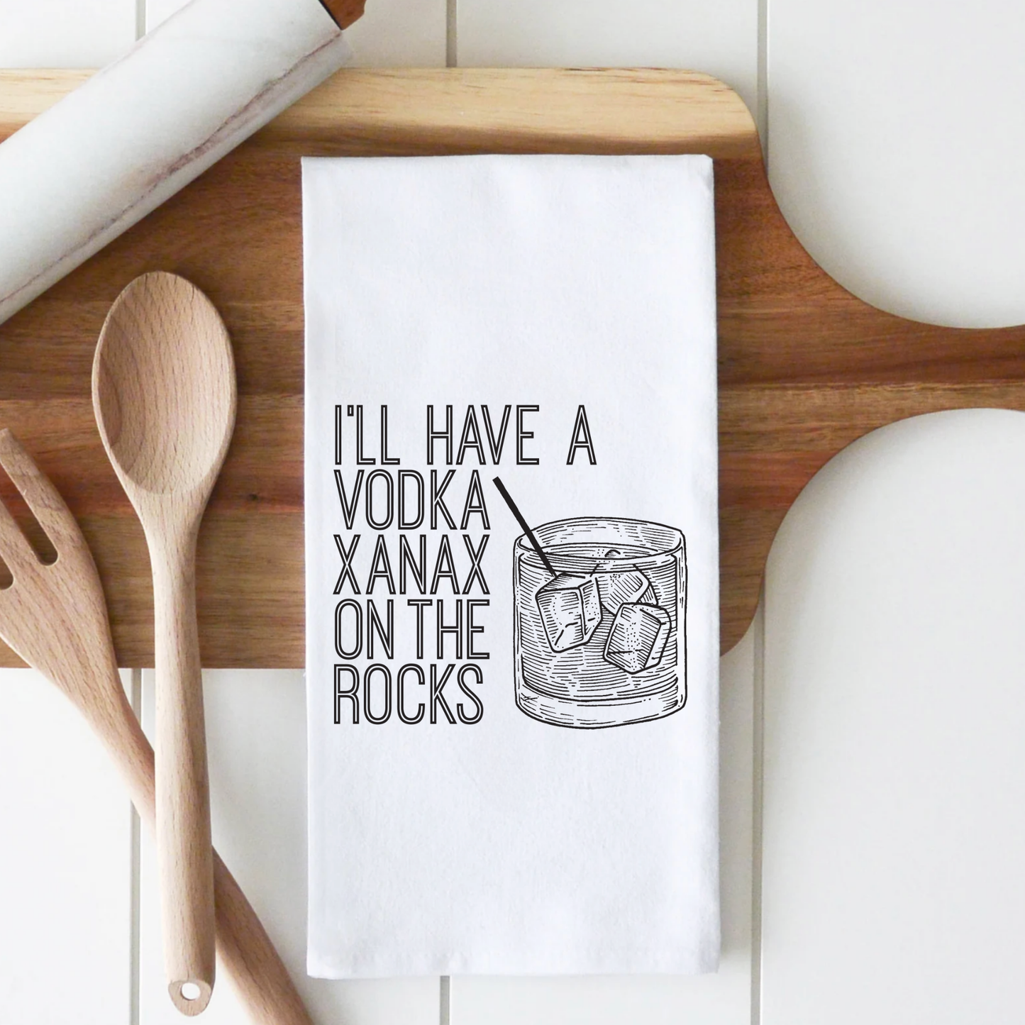 White cotton tea towel featuring the text "I'll have a vodka Xanax on the rocks" alongside an illustration of a drink.