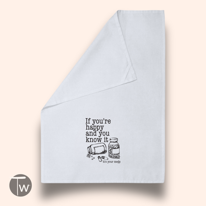 White cotton tea towel featuring the text "If you're happy and you know it" with a graphic of a pill bottle and pills.