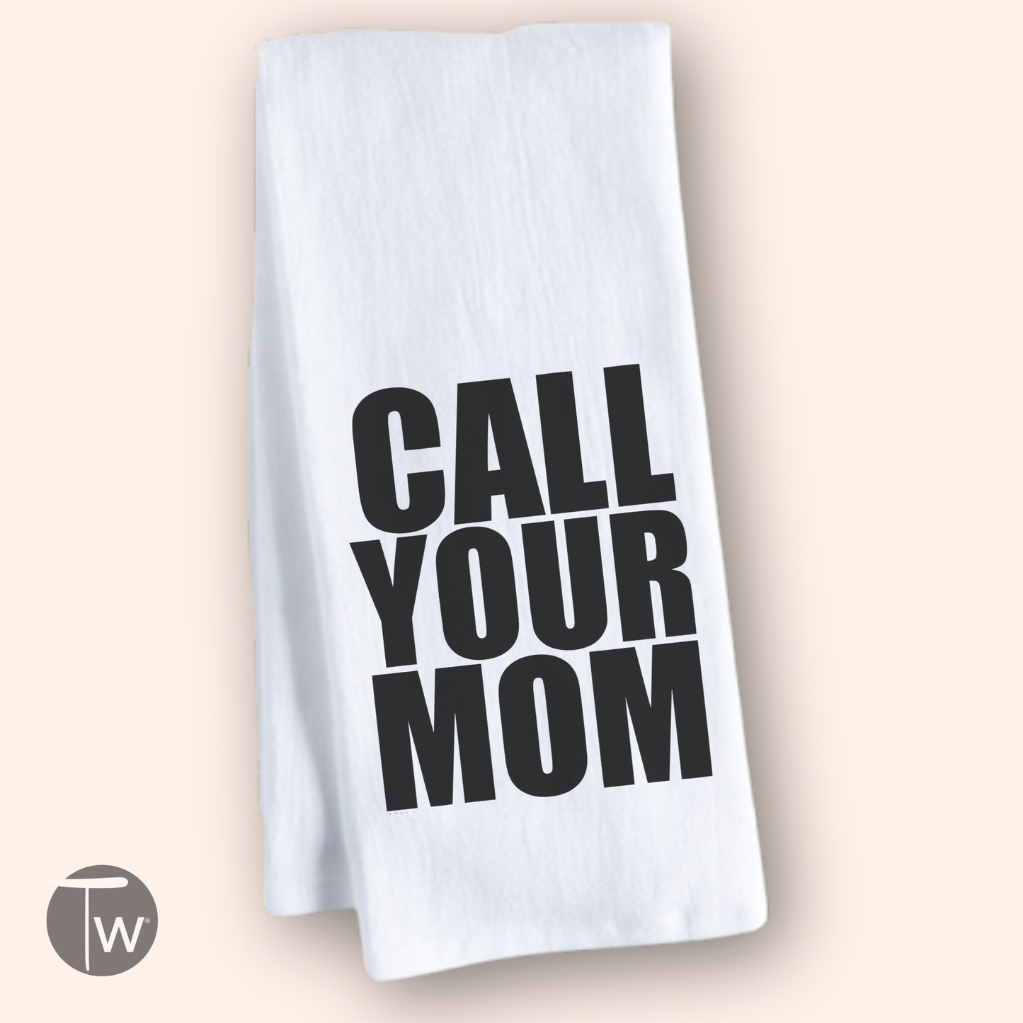 White cotton tea towel with bold black text reading "CALL YOUR MOM.