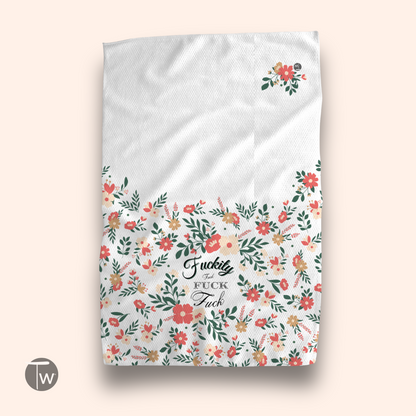 Vintage Fkity Fk towel featuring a floral design with colorful flowers and the text "Fkity Fk" in the center.
