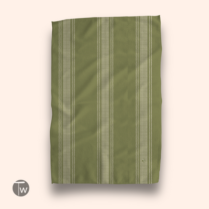 Pardon My French Stripe Fall Illusion towel in olive green with white stripes, displayed flat against a light background.