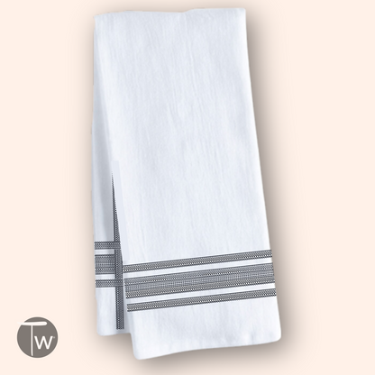 Fckity Stripe Illusion black cotton tea towel with black striped pattern on a white background.