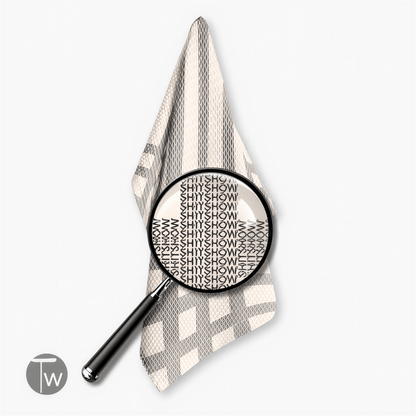 Vintage kitchen tea towel featuring a classic design with the word "SHITSHOW" in bold, black lettering on a striped backgr...